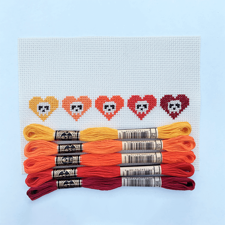 DMC broderigarn - 5 orange/røde nuancer